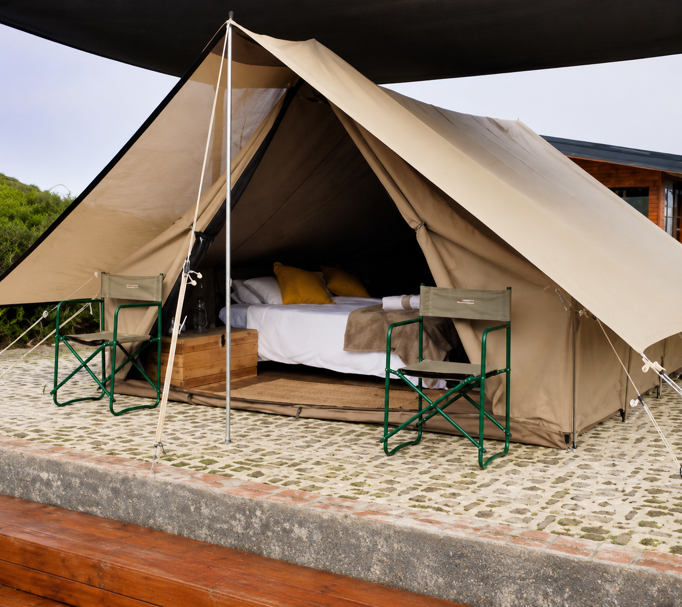 Safari tent interior for event guests | Glamping Safari tent accommodation
